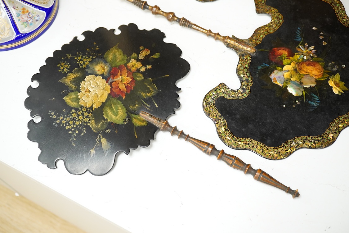 Three early Victorian papier maché hand screens, two with abalone inlay, 39cm in length